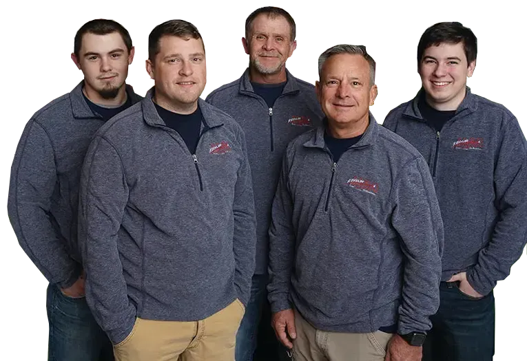 A group of men are posing for a picture together