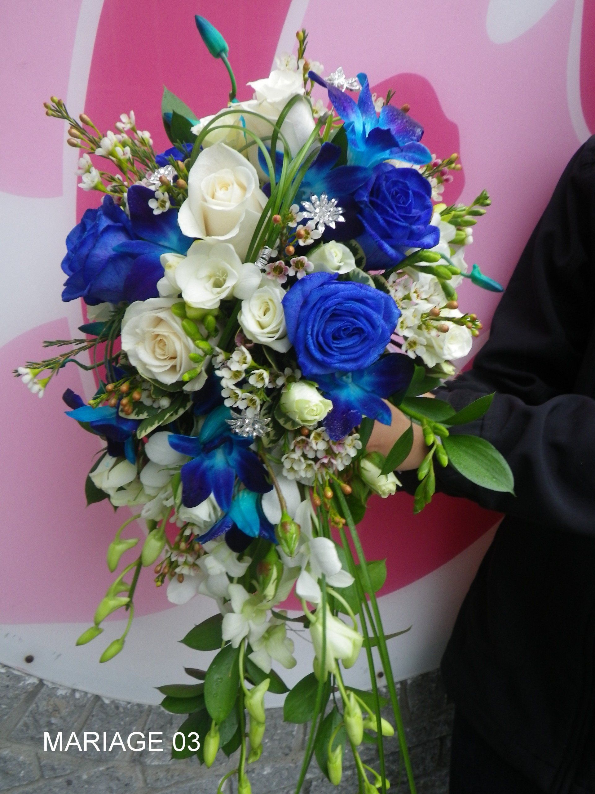bouquet of white and blue flowers