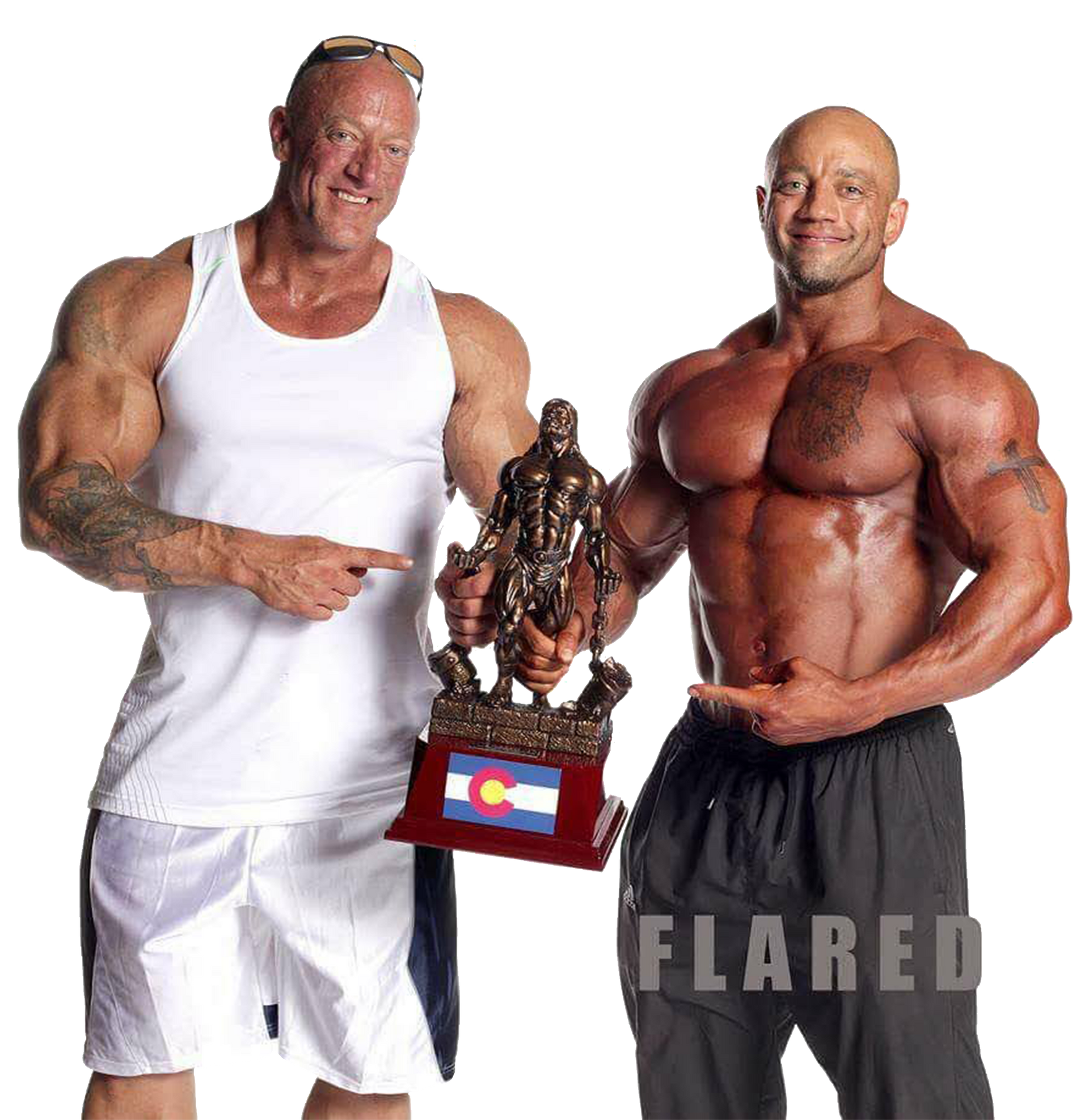 Chris Havekost, owner of Prodigy Gym, proudly holding a trophy showcasing his bodybuilding achievements.