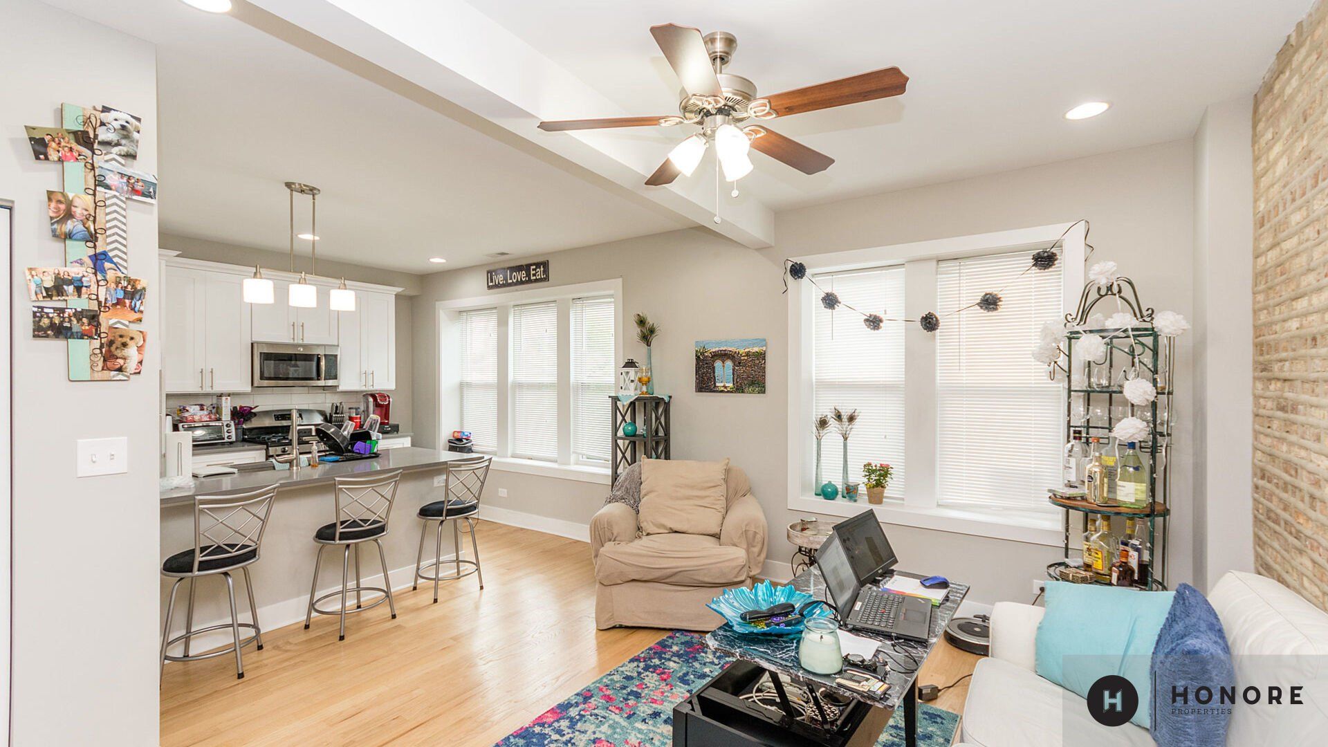 3751-57 N Western Ave living area with ceiling fan