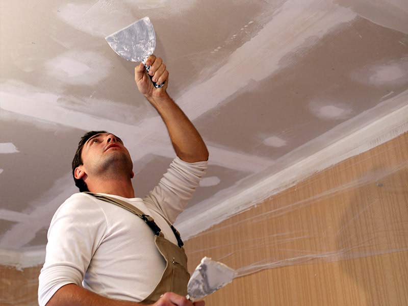 painter painting the ceiling