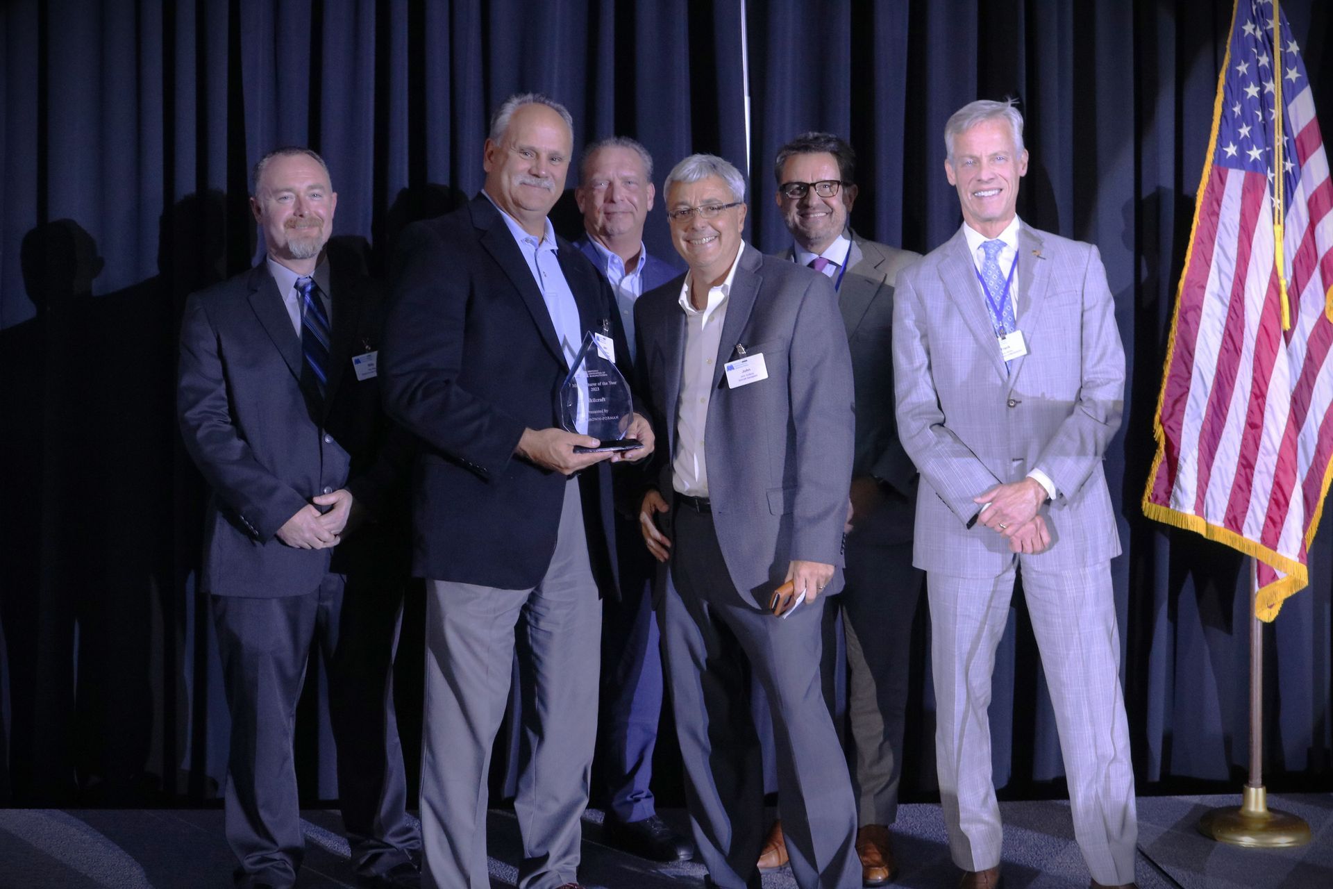 John Zurborg accepting Manufacturer of the Year award