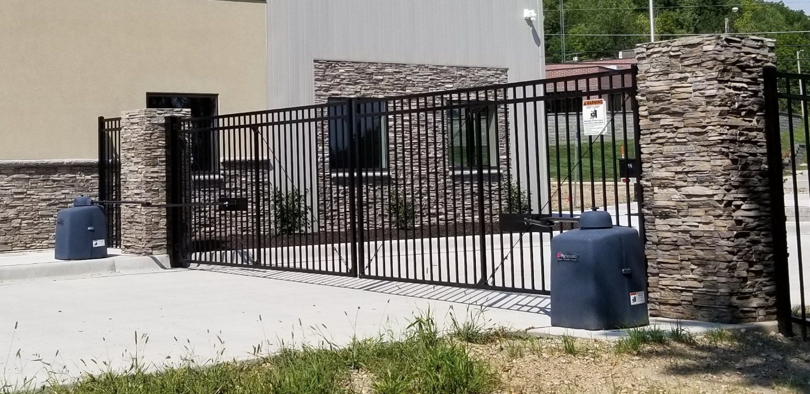 A fence with a sign that says no parking on it