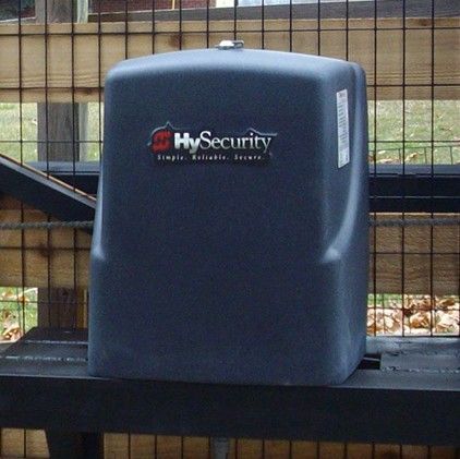 A black sliding gate motor is powered by smart dc.