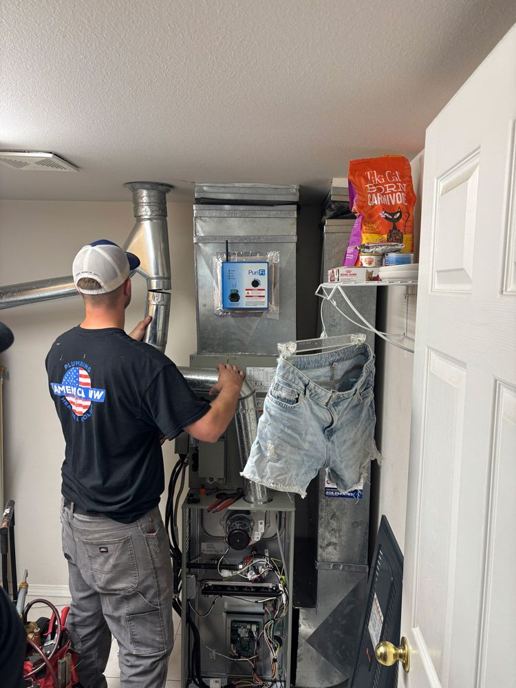 Plumber Checking Water Softener — America NW Plumbing, Heating, and Cooling in Post Falls, ID
