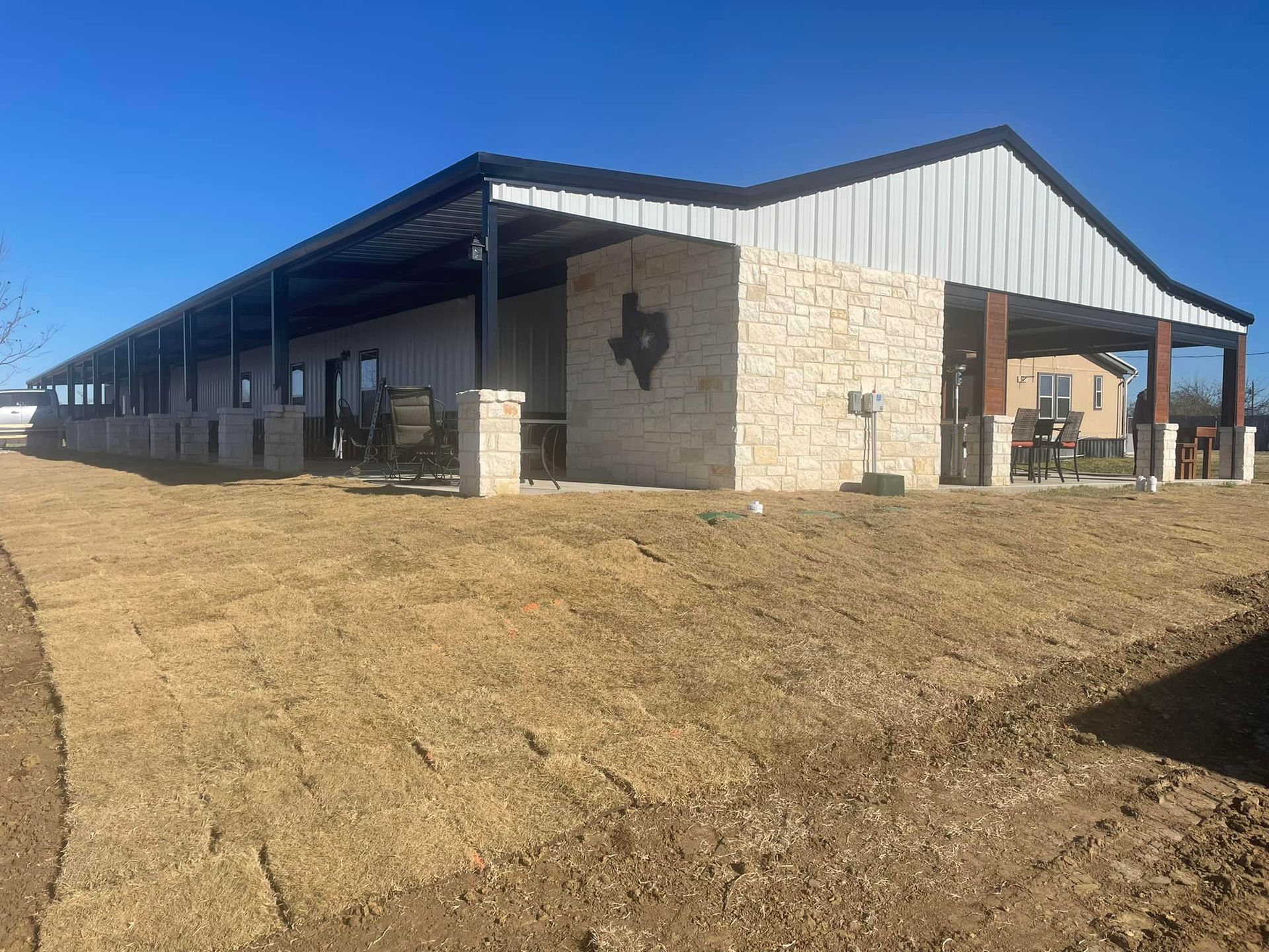 A large building with a texas flag on the side of it.