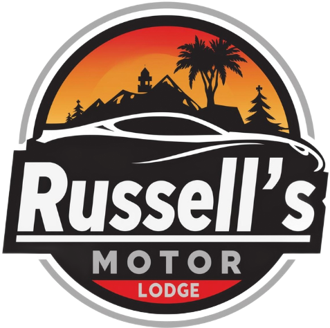 Logo for Russell's Motor Lodge: car silhouette over a sunset, black and white text in a circular emblem.