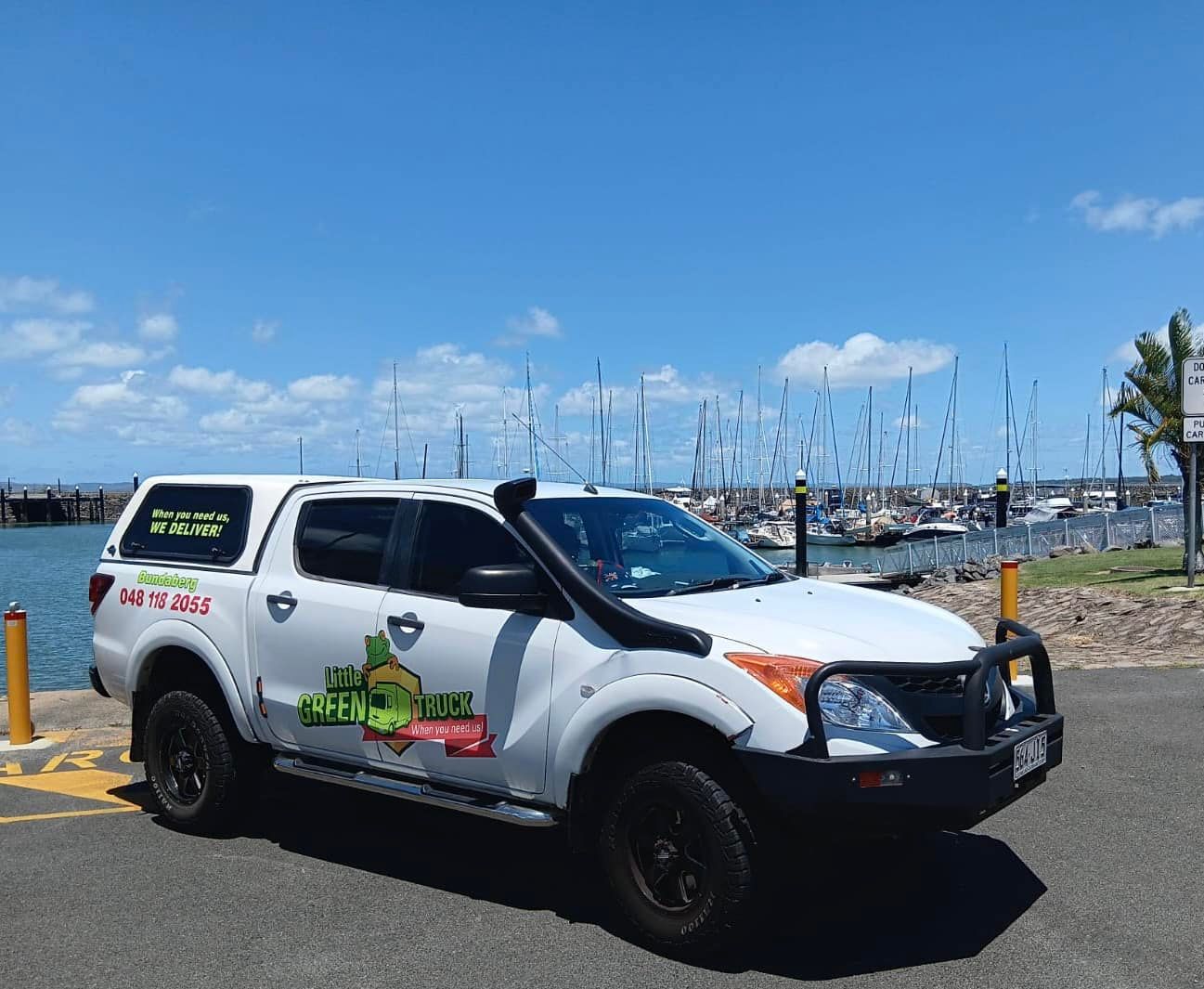 White Truck Parked at a Marina Under a Blue Sky — Little Green Truck Bundaberg In Hervey Bay, QLD 