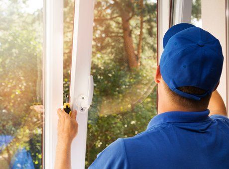 Window Replacement — Worker Installing A Window In Columbus, OH