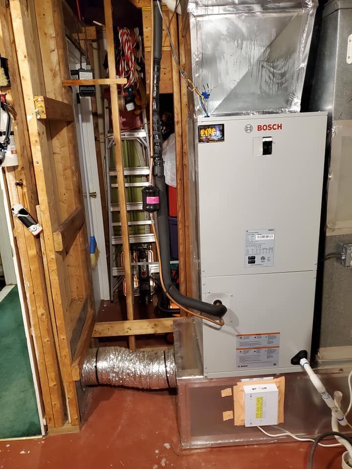A bosch air conditioner is installed in a basement.