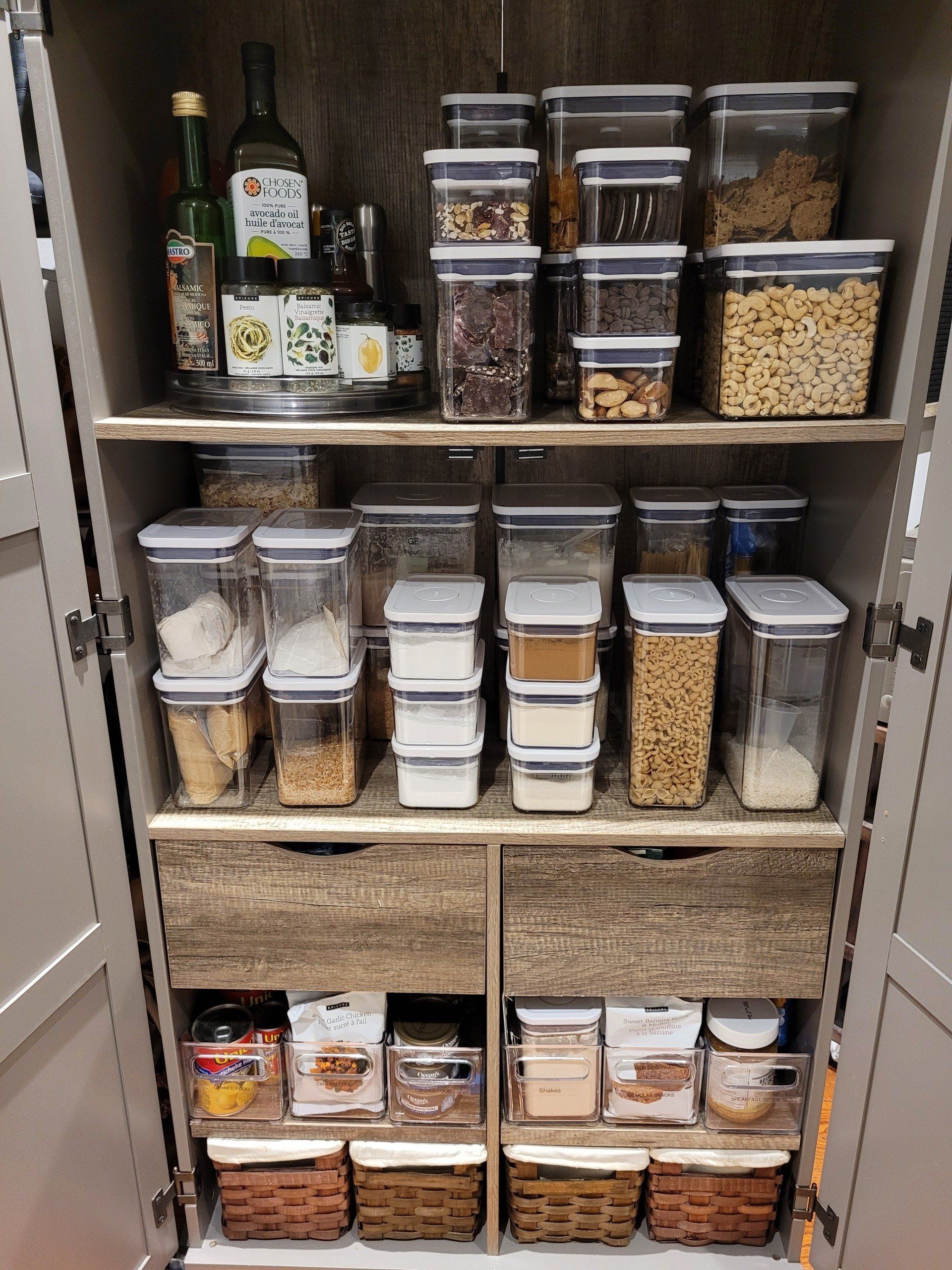 A pantry filled with lots of containers and baskets