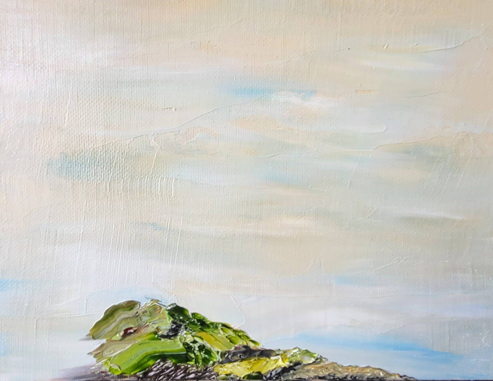 This miniature Island is an 8 in. x 6 in. oil on Masonite. Jutting from the bottom of the painting and sticking its head boldly above the horizon which is just under the first third of the Masonite this Island is small and full of vegetation, bold greens.  The sky is a blend of Buff White, blue and white. The sea and the horizon are joined in a manner that you are well above so as to peer out into the vast expanse.