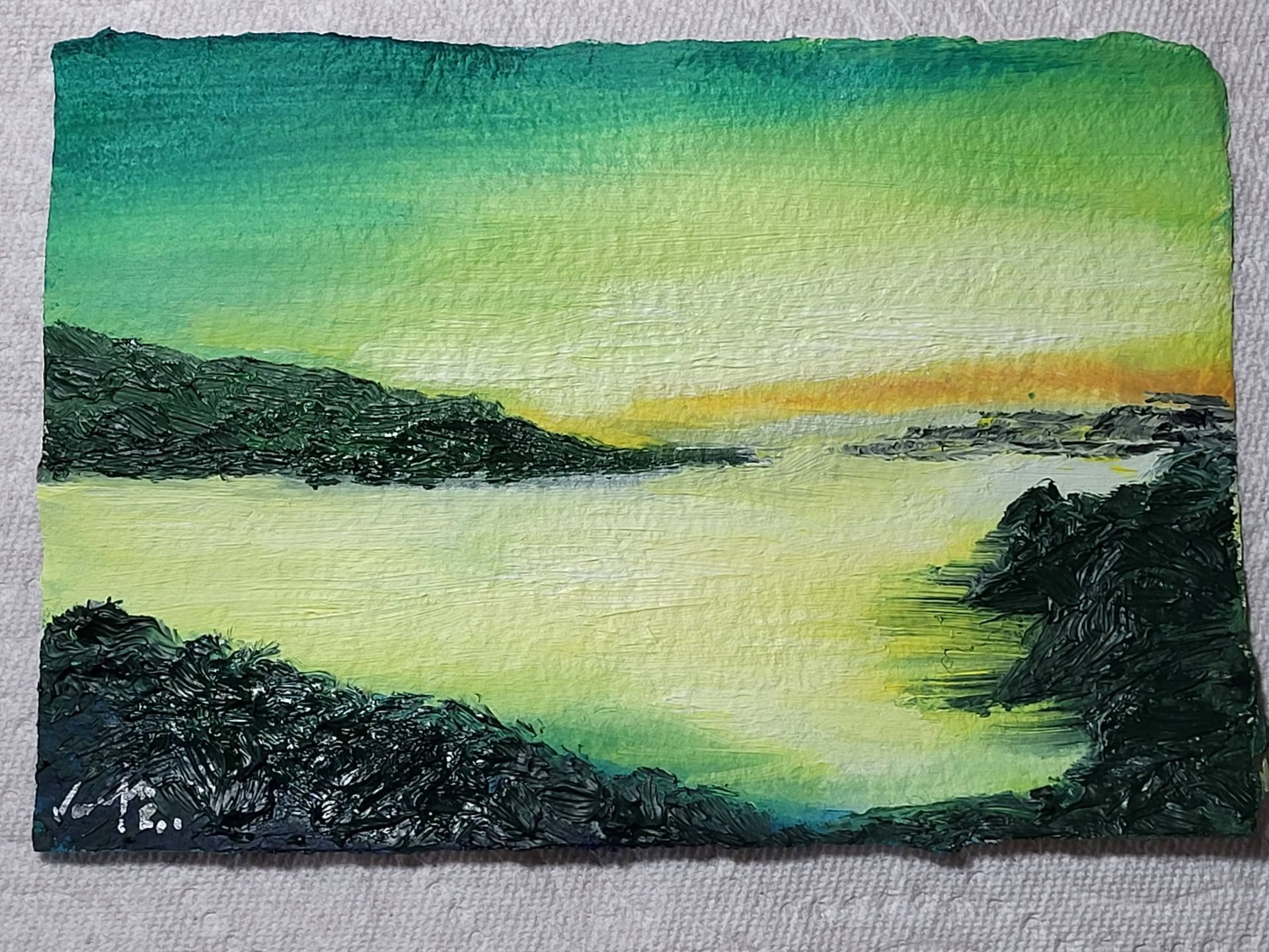 #O-CP-11 Oil on Hand Made Cotton Paper 7 in. x 4.75 in. A serene sunset on a quiet cove reflects the greenish sky's blend with yellow.