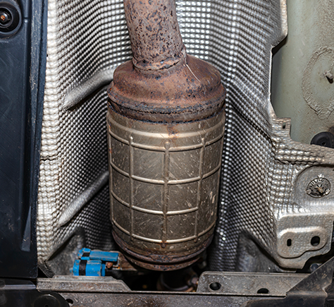 A close up of a diesel particulate filter in a car