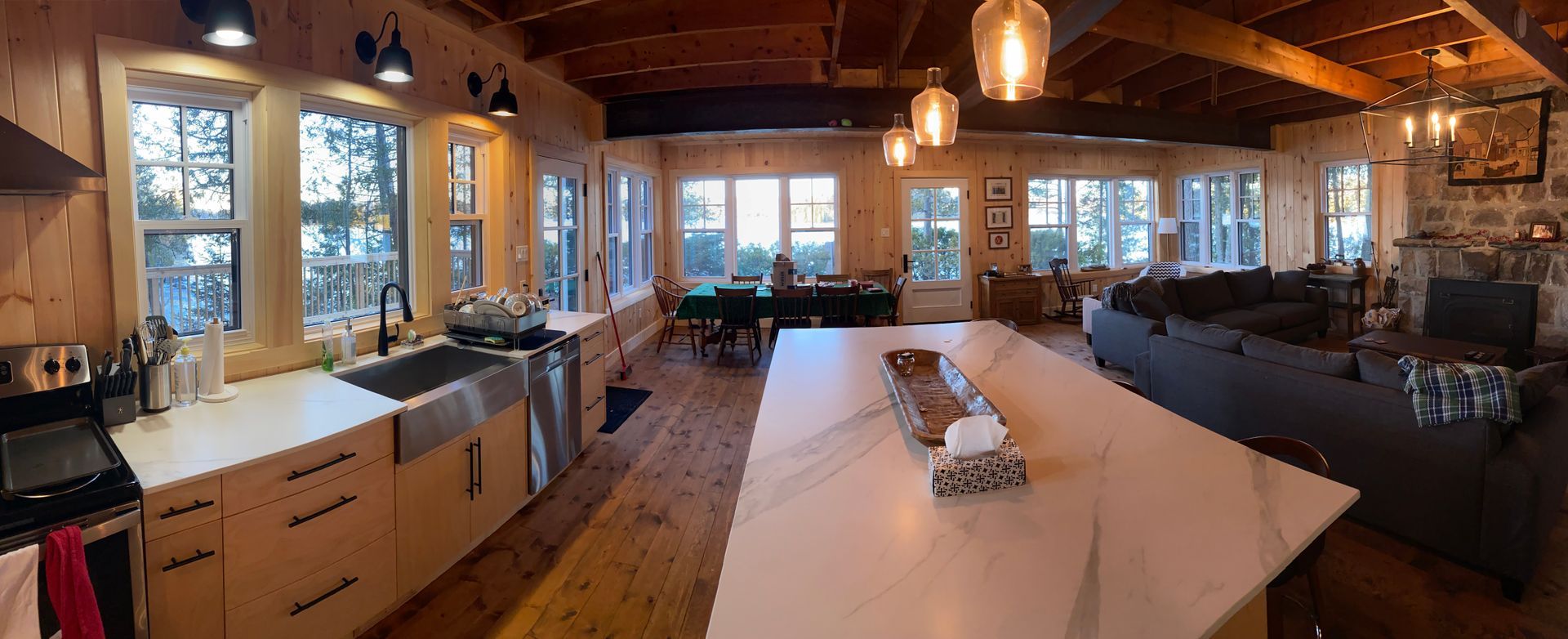 A kitchen with a large island in the middle of the room.