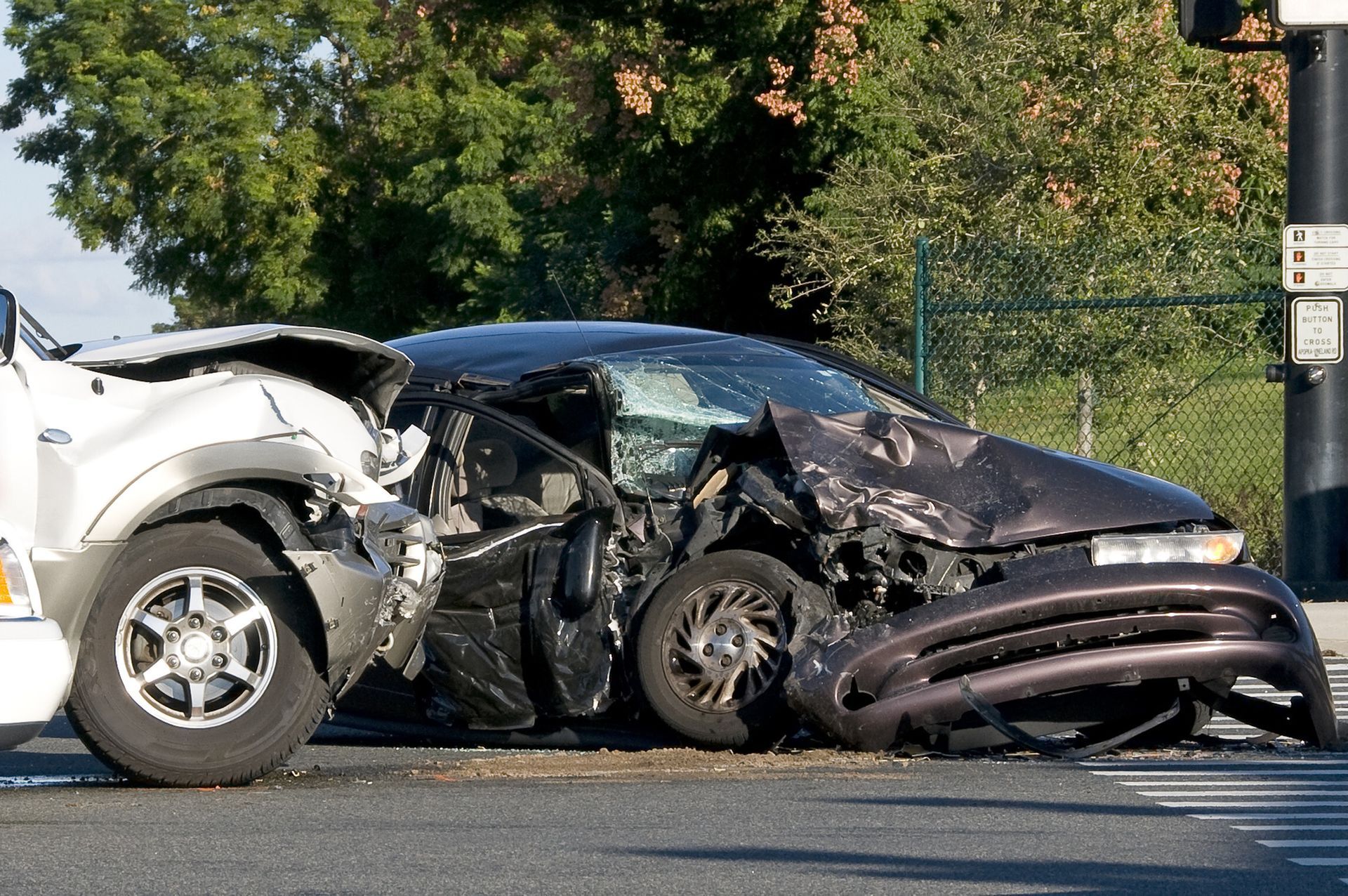Firefighters and police respond to a car accident.