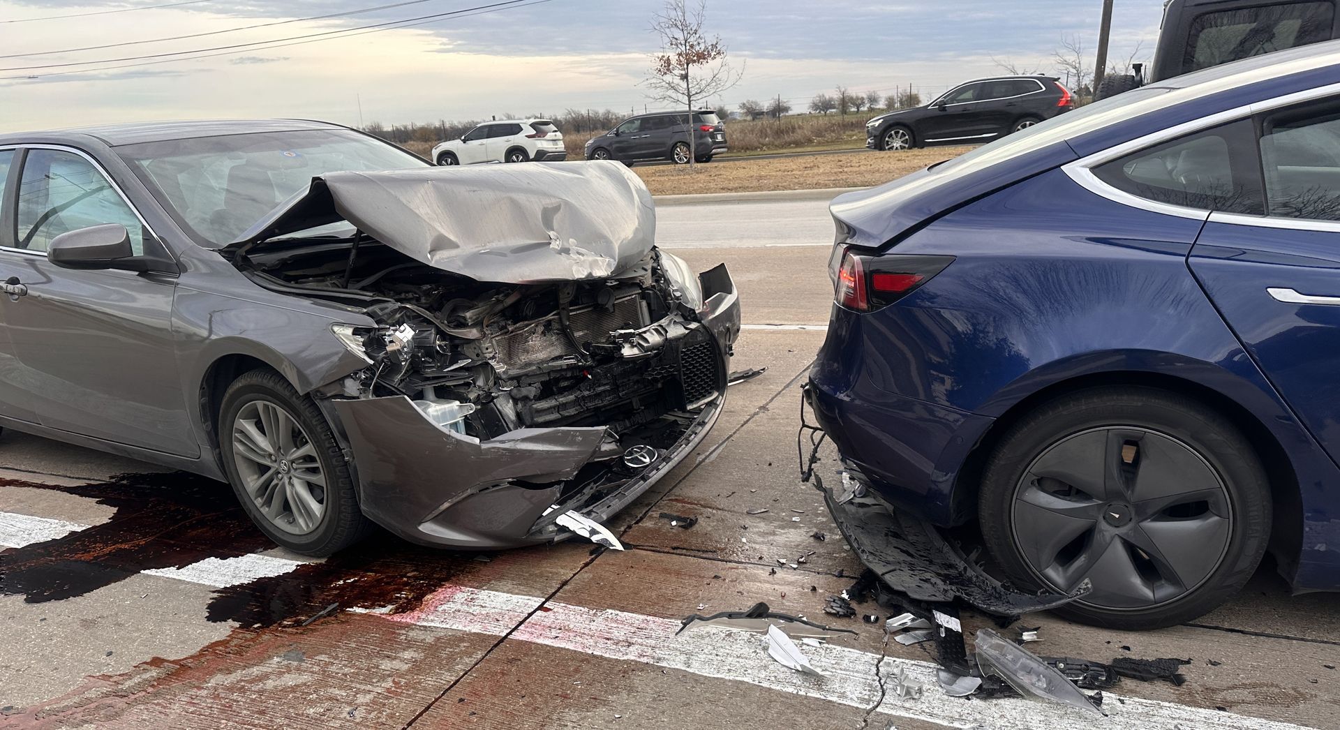 Grey sedan rear-ends a blue car on Coit Road in Frisco
