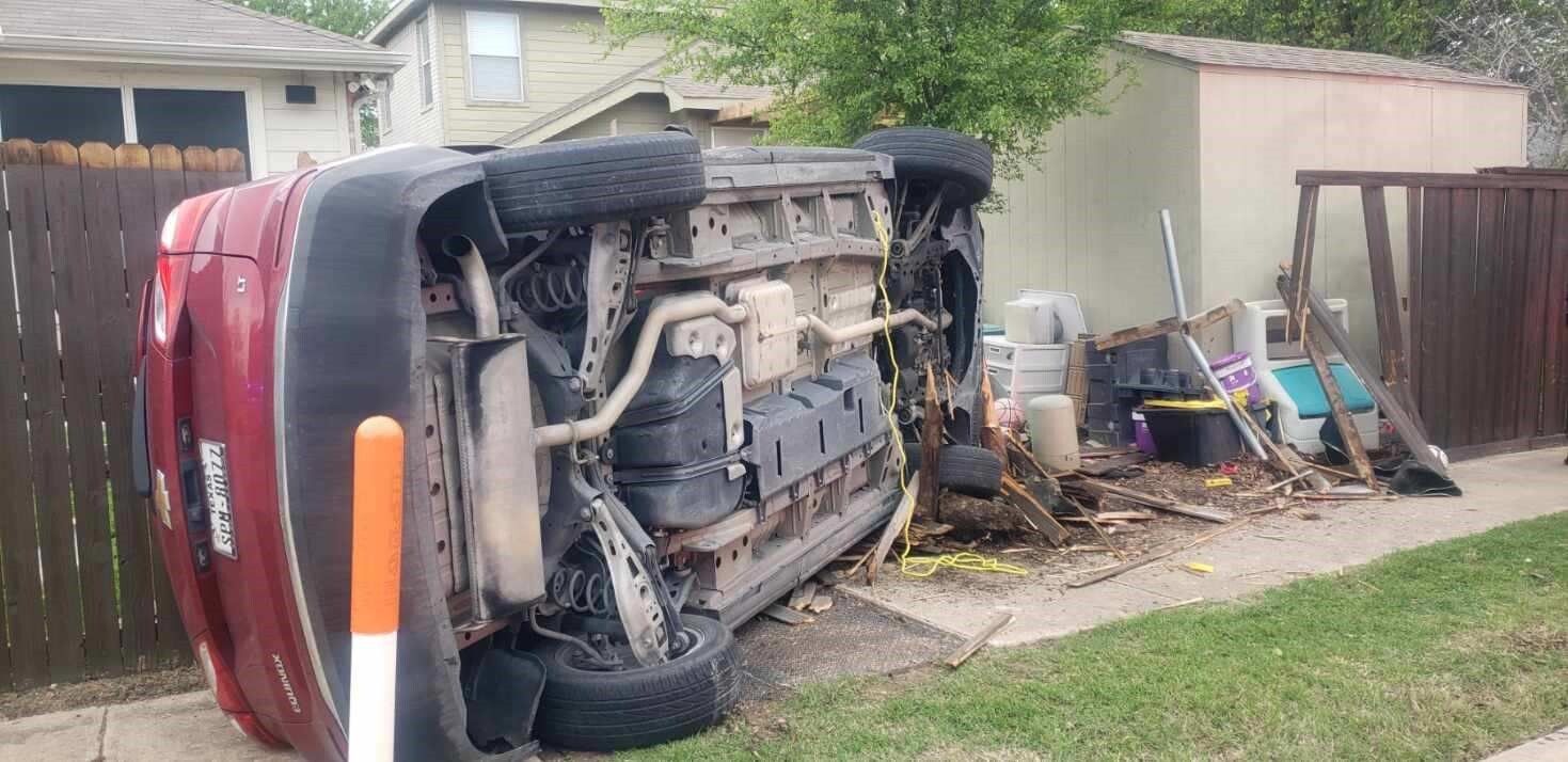 Client's car rolled over onto its side after a driver failed to yield on Oakmont Rd in Fort Worth