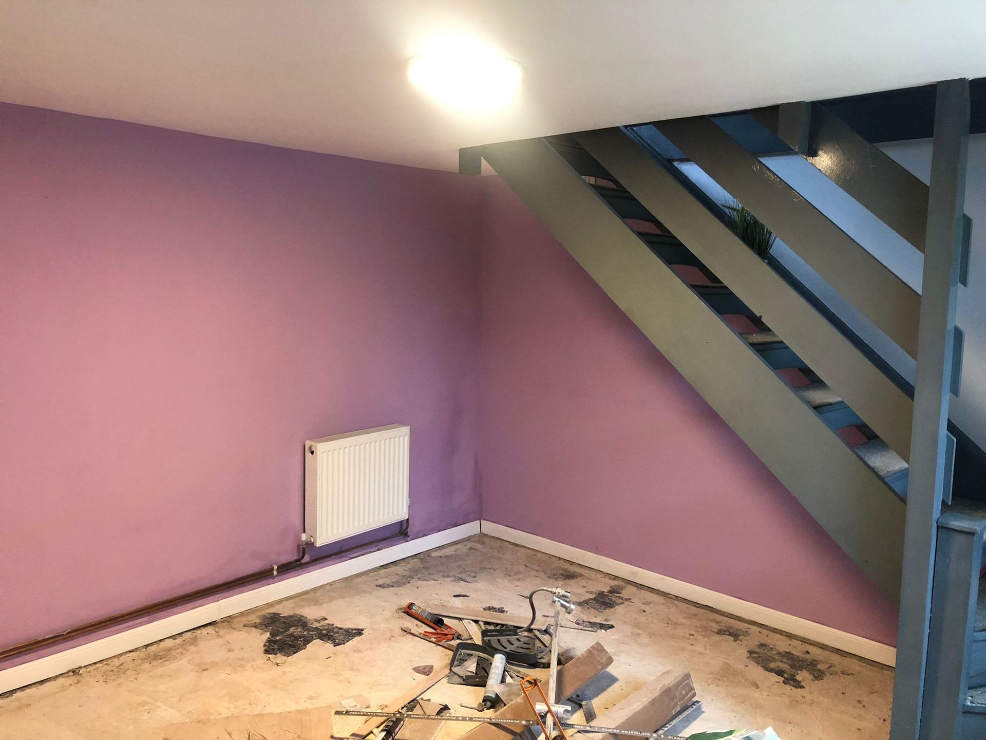 Elite Edge Painters and Decorators Manchester - room painted lilac with white woodwork