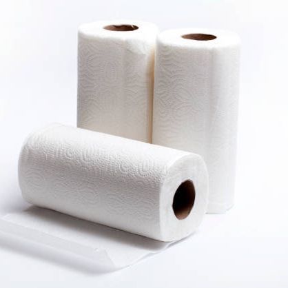 Three rolls of paper towels are stacked on top of each other on a white surface.