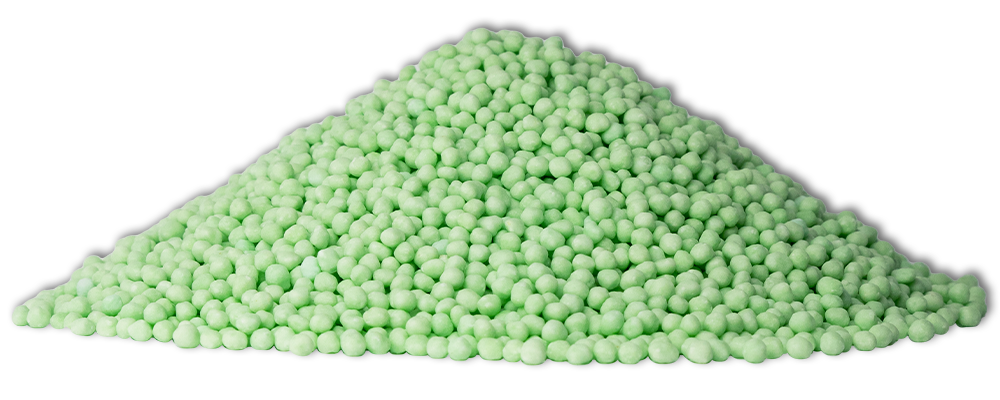a pile of the product UMAXX, green standard size SGN granules