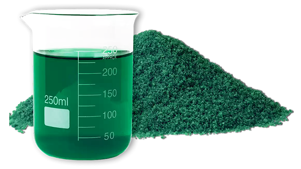 DuoTech product powder with a beaker in front with dissolved DuoTech that is creating a teal transparent liquid