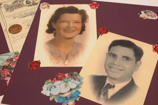 Two portrait photos on a purple memorial scrapbook page with floral decorations