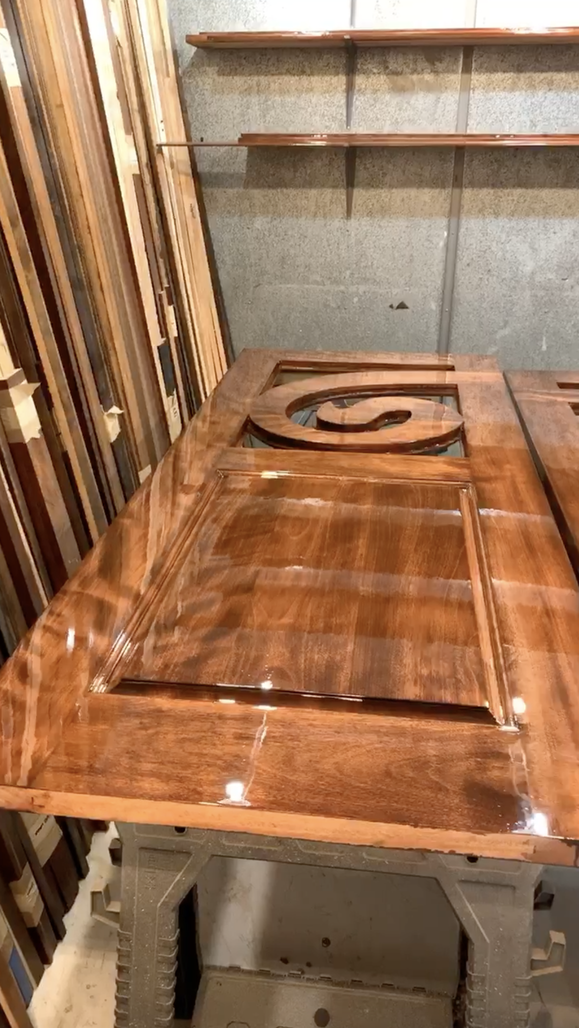 Finishing touches being put on the custom wood door