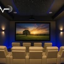 A home theater with a large screen and a lot of seats.