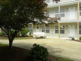 The Commons at Greenwood Courtyard with Bench
