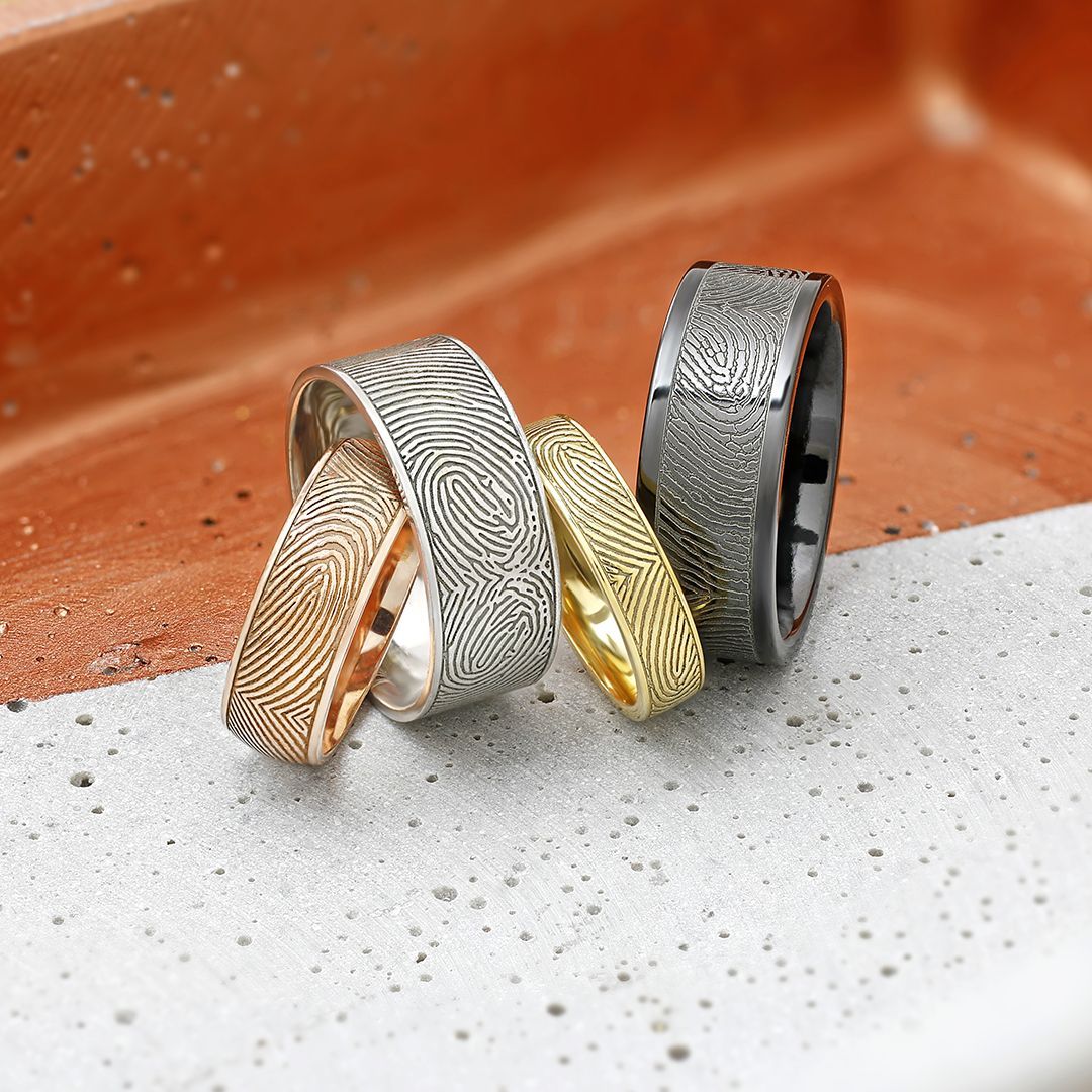 Three rings are stacked on top of each other on a table.