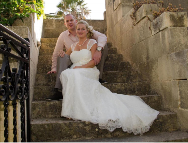 A couple in our wedding dress
