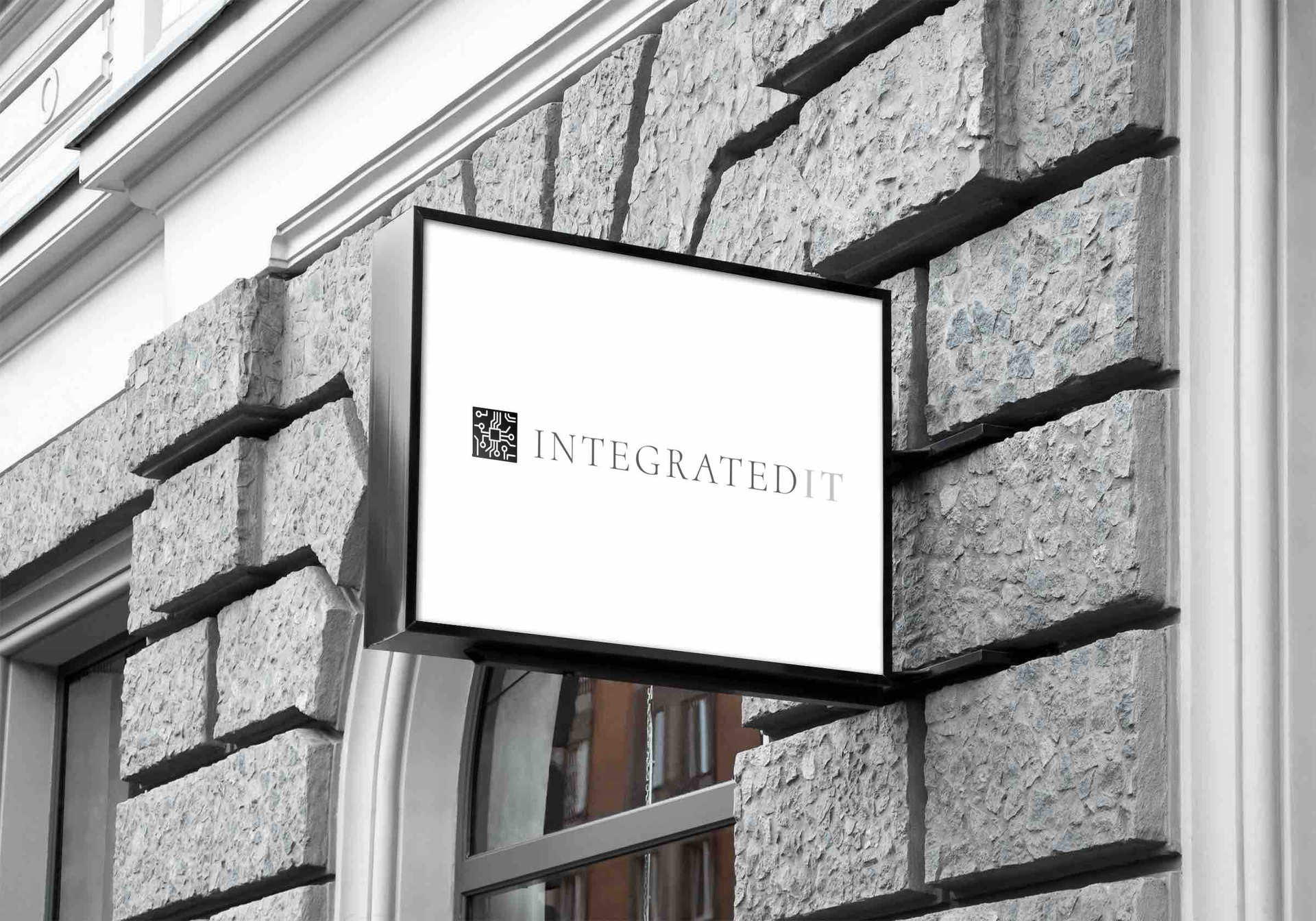 Sign on a stone building with the logo
