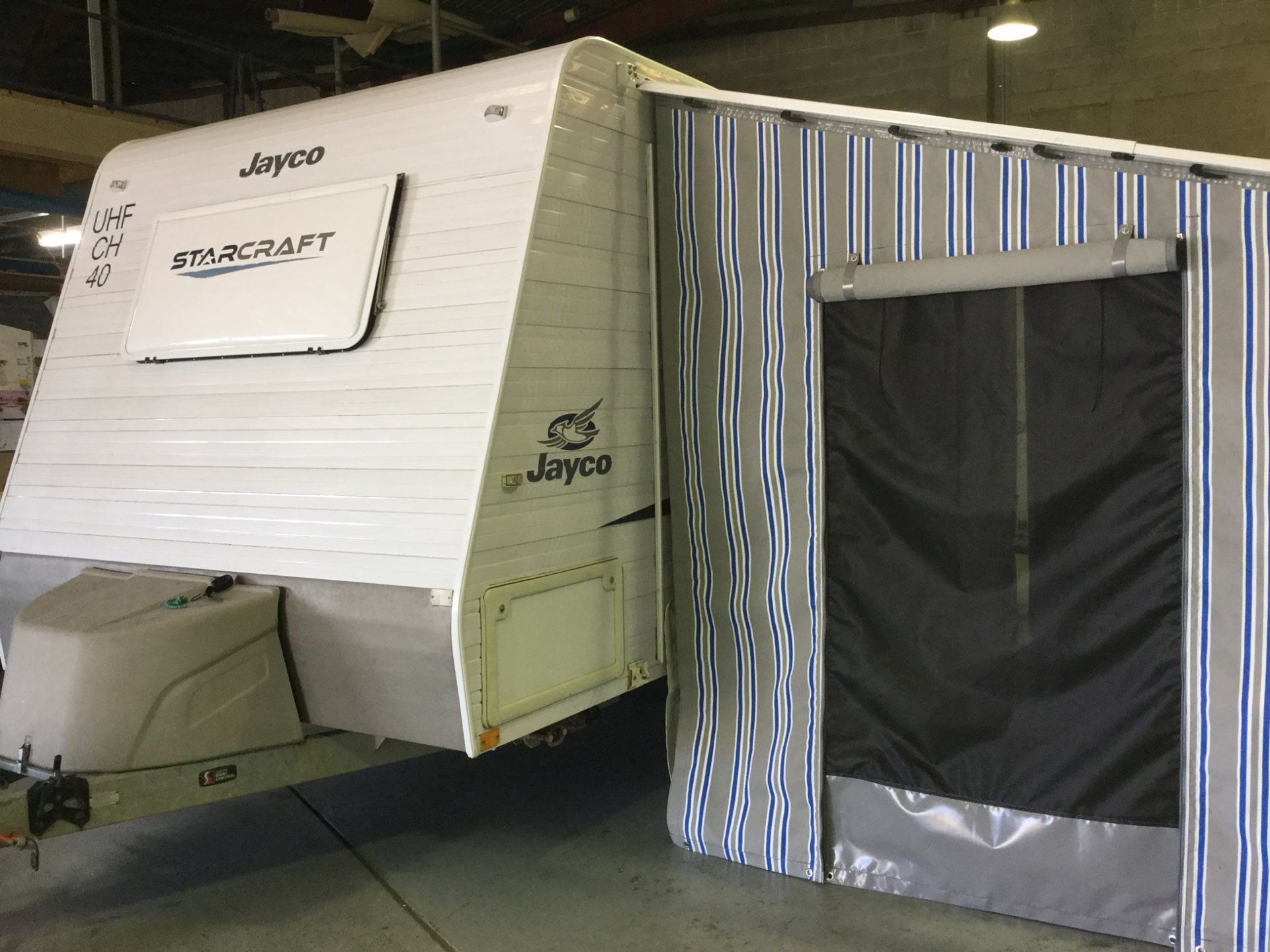 car with tent on the side