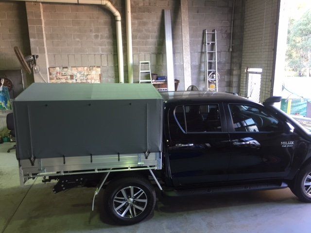 black car with tent on the back