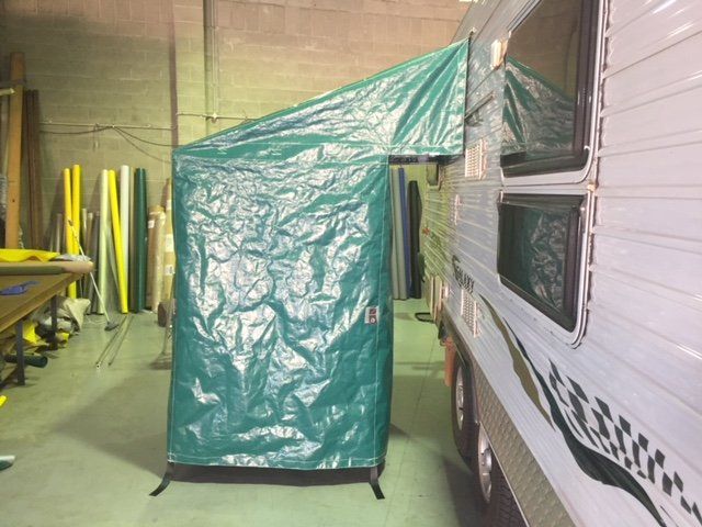 portalet cover beside a van