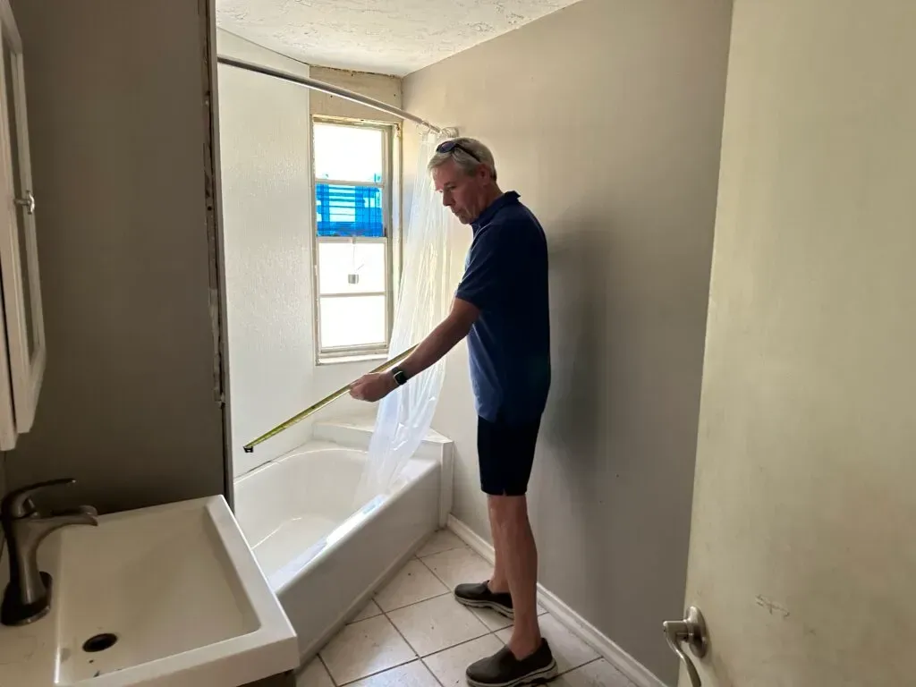 Bill Taking Measurements  | Sarasota, FL | Home Buyers Plus, LLC