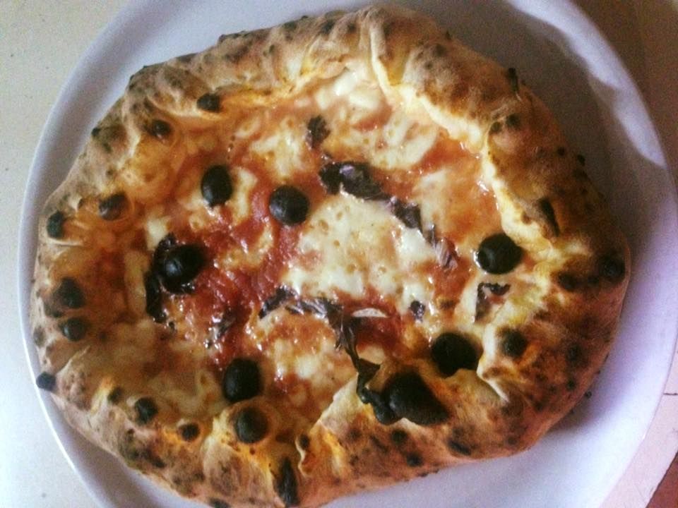 pizze cotte nel forno a legna