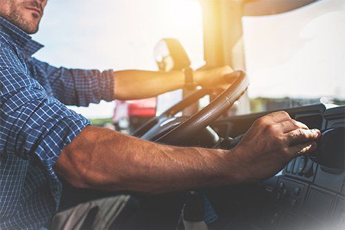 Man Driving A Truck