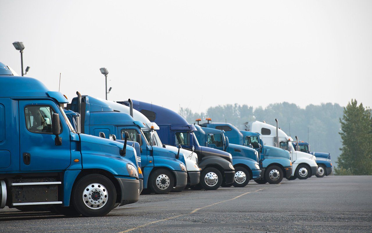 Trucks Parked — Santa Clarita, CA — COMMERCIAL TRUCKING SCHOOL