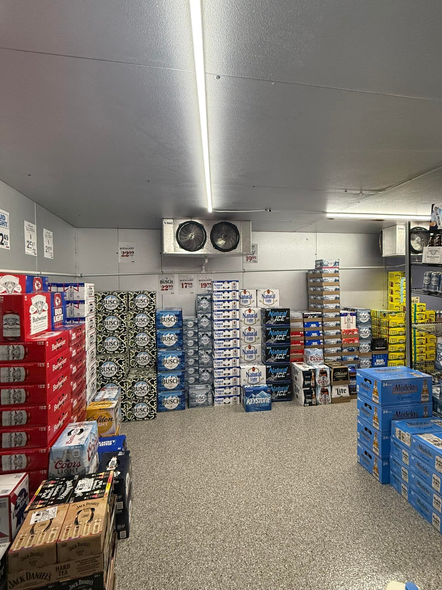 A large warehouse filled with lots of boxes and crates.