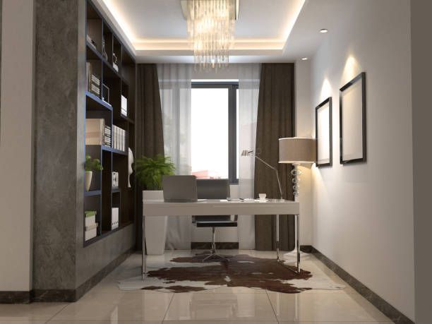 A hallway with a desk and chair in it
