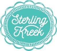 The logo for sterling kreek is a blue oval with white writing on it.