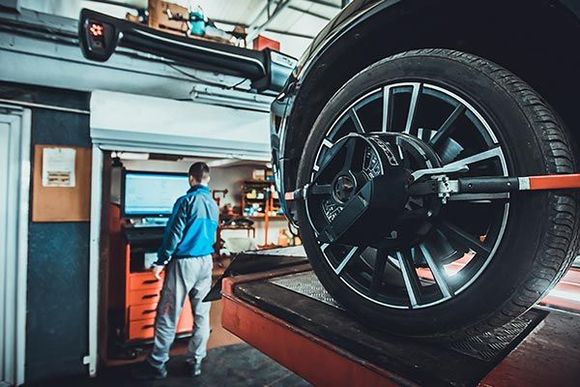 Wheel Alignment Equipment on Car — West Monroe, LA — Gene’s Tire Service