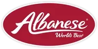 Logo for Albanese candy. Red oval background with white cursive "Albanese" text and "World's Best."