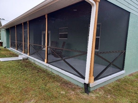 A Screened in Porch on the Side of a House