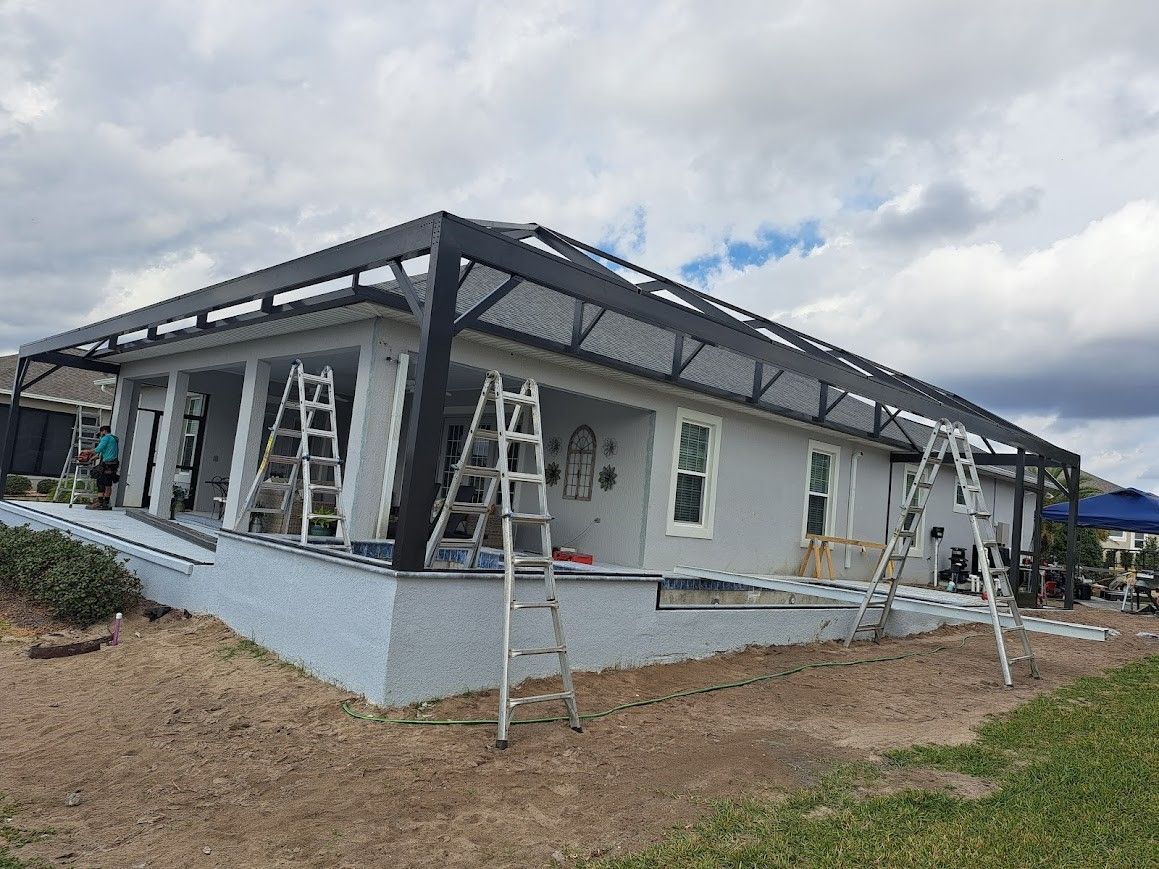 A house with a canopy being built on top of it.