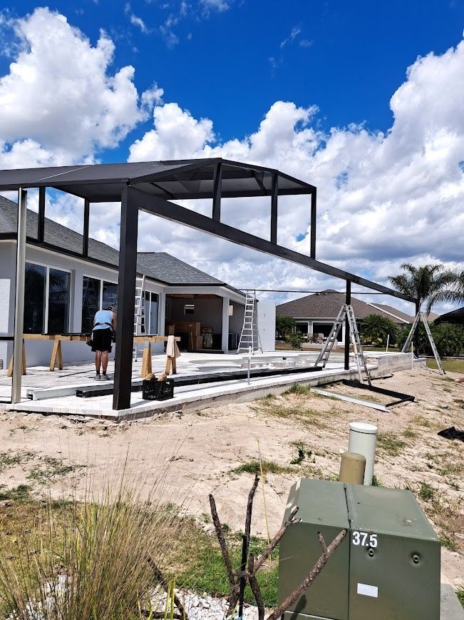 A house is being built with a roof that is being built.