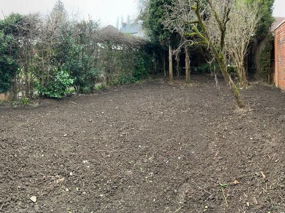 Slabbing and railway sleeper walls in Dudley