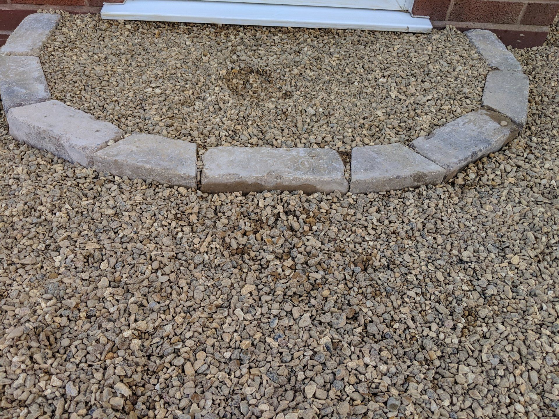 Close up of gravel step to front door
